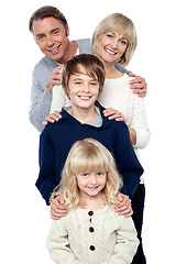 Image showing Complete family. Daughter, son, mother and father