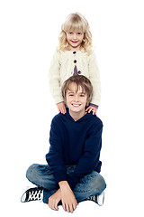 Image showing Affectionate brother and sister posing for a portrait