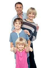 Image showing Group portrait of a playful family of four