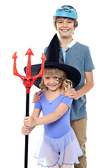 Image showing Boy and girl wearing halloween costume