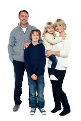 Image showing Happy family posing in trendy winter wear outfits