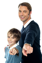 Image showing Charming father and son pointing at you