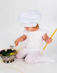 Image showing baby girl in the cook hat