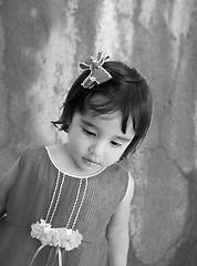 Image showing Black and white portrait of tired little girl with sad eyes. 