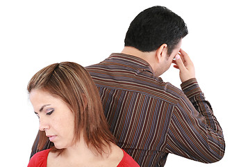 Image showing Young couple standing back to back having relationship difficult