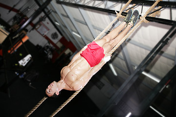 Image showing Crossfit Rope Training on a dark background.