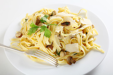 Image showing Pasta ai funghi with fork