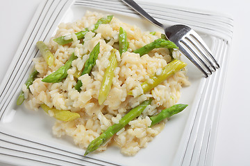 Image showing Asparagus risotto with fork