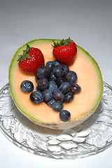 Image showing cantaloupe, blueberries and strawberries