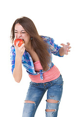 Image showing beautiful girl eats an apple