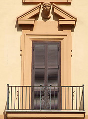 Image showing Orange wall and a decorative balcony