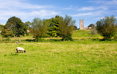 Image showing Church St James across meadow in Chipping Campden