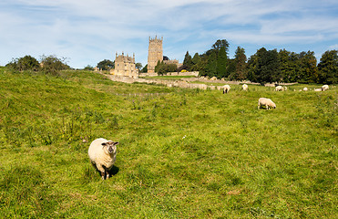 Image showing Church St James across meadow in Chipping Campden