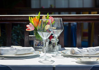 Image showing Table setting exterior restaurant in sunshine