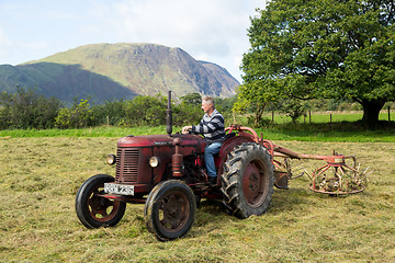 Image showing Antique David Brown tractor and threshing machine