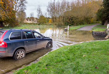 Image showing Car crossing deep ford in Shilton Oxford