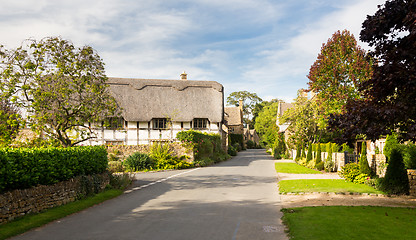 Image showing Thatched cottages on main street of Stanton