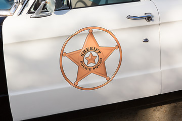 Image showing Vintage police car detail on door