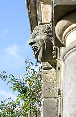Image showing Old gargoyle with ugly open mouth