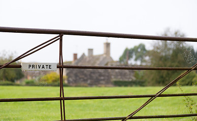 Image showing White private sign on farm gate 