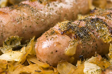 Image showing Roasted sausages with sauerkraut - polish dish