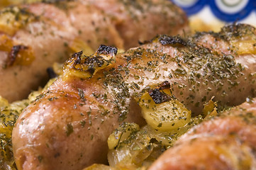 Image showing Roasted sausages with sauerkraut - polish dish