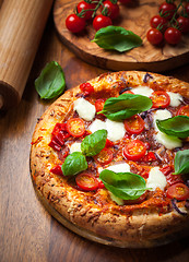 Image showing Pizza with salami and mozzarella