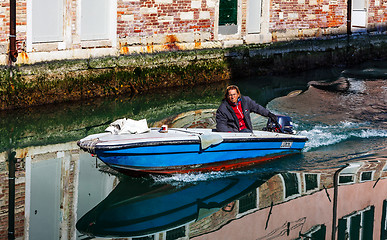 Image showing Motorboat on a Small Venetian Canal