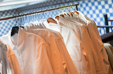 Image showing Hanging shirts