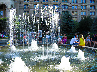 Image showing View on summer town with fountain