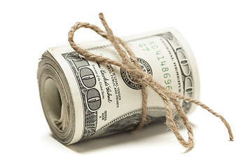 Image showing Roll of One Hundred Dollar Bills Tied in Burlap String on White