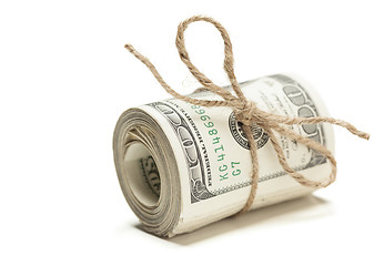 Image showing Roll of One Hundred Dollar Bills Tied in Burlap String on White