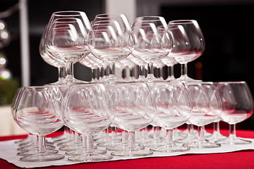 Image showing empty glasses for cognac on  festive table