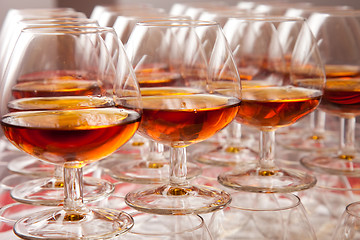 Image showing glasses of cognac on  festive table