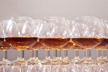 Image showing glasses of cognac on  festive table