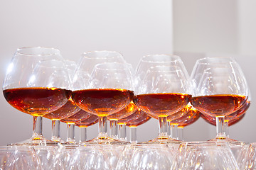 Image showing glasses of cognac on  festive table