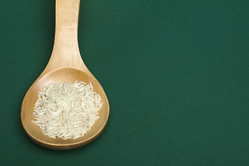 Image showing Basmati rice in wooden spoon 
