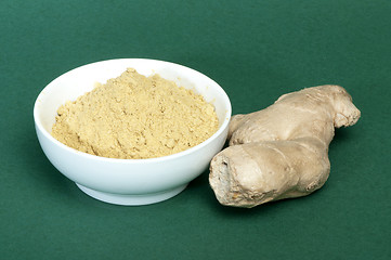 Image showing Powdered ginger in a bowl and whole ginger