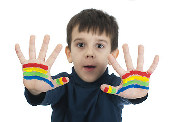 Image showing Boy hands painted with colorful paint