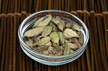 Image showing Dried cardamon in a bowl 