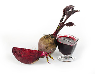 Image showing Red beets with leaves, slice beets and jug with juice