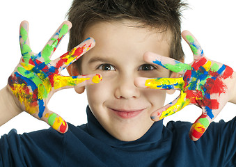 Image showing Boy hands painted with colorful paint