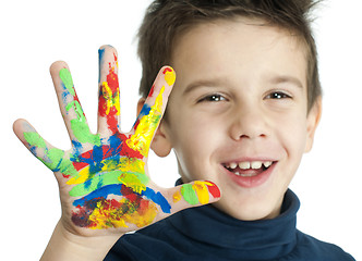 Image showing Boy hands painted with colorful paint