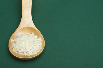 Image showing Rice baldo in wooden spoon 
