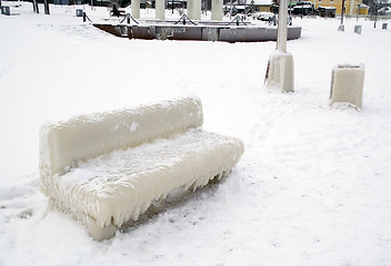 Image showing Bench covered with thick coat of ice.