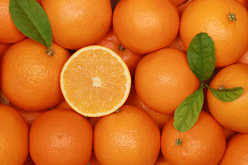 Image showing Oranges with leaves