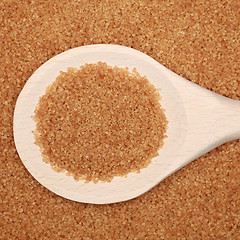 Image showing Brown sugar on a wooden spoon