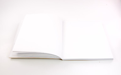 Image showing Blank book with white cover on white background. 