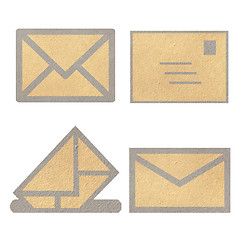 Image showing Brown Vintage Envelope with blank paper on white. 