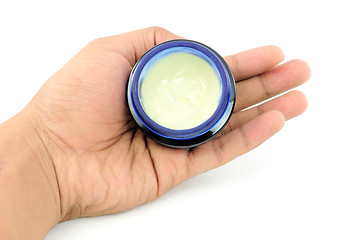 Image showing moisturizing cream in the women's hands 